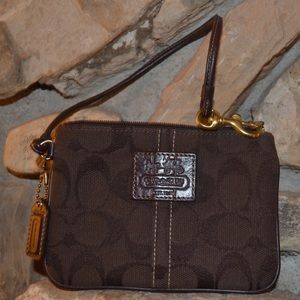 authentic small coach signature darkbrown wristlet